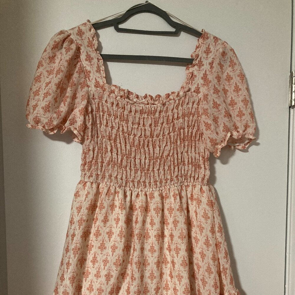 Pink floral smocked mini dress